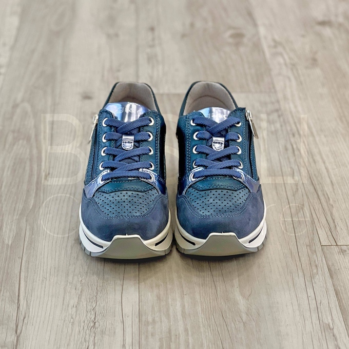 Sneaker traforata zip in Pelle
