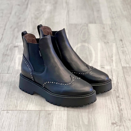 Beatles in Pelle borchie e coda di rondine